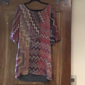 Single 100% silk with jersey back dress. Size M.